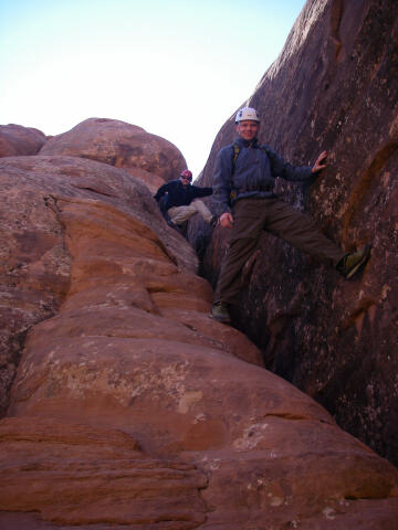 Downclimbing the crack.